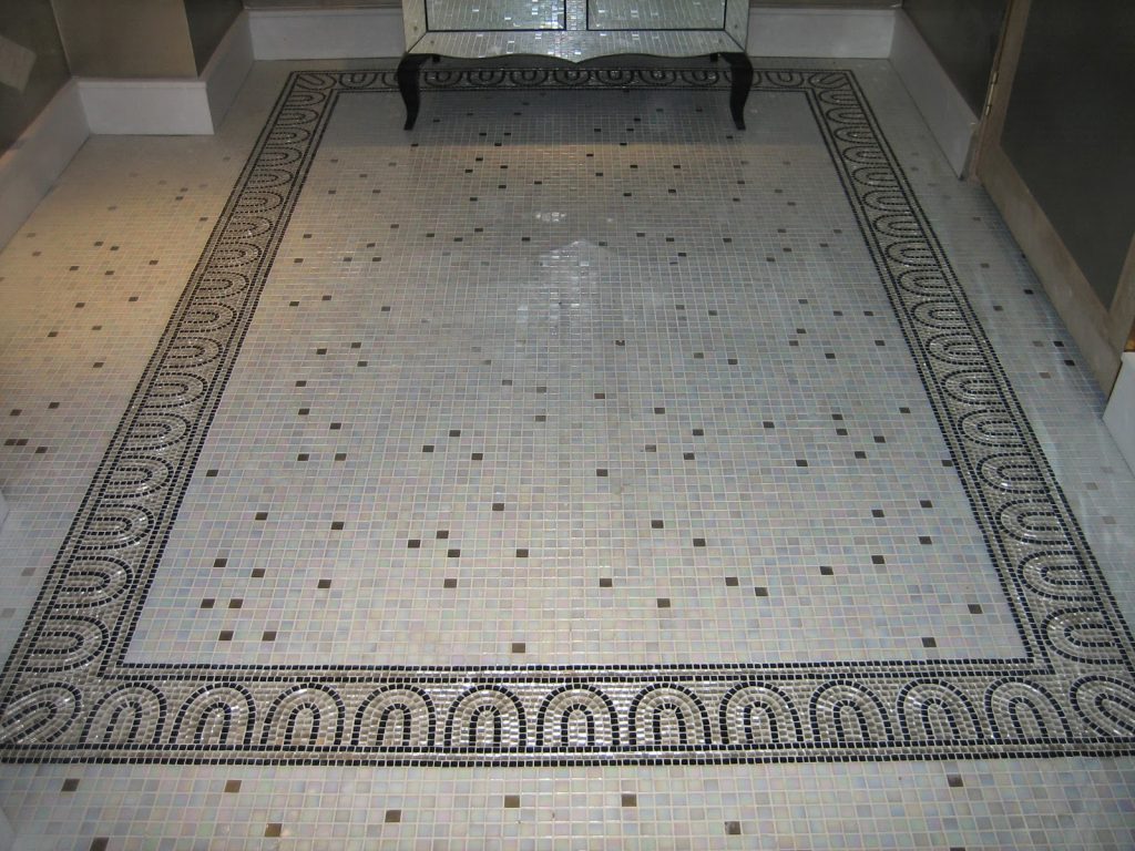 Bisazza mosaic floor with intricate border insert